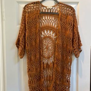 Orange open stitch crochet cardigan